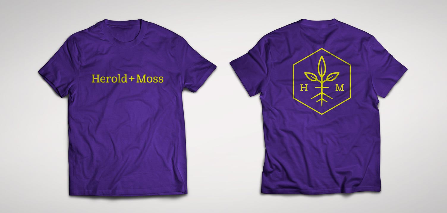 Purple T-shirt mockup with Herold and Moss logos on front and back