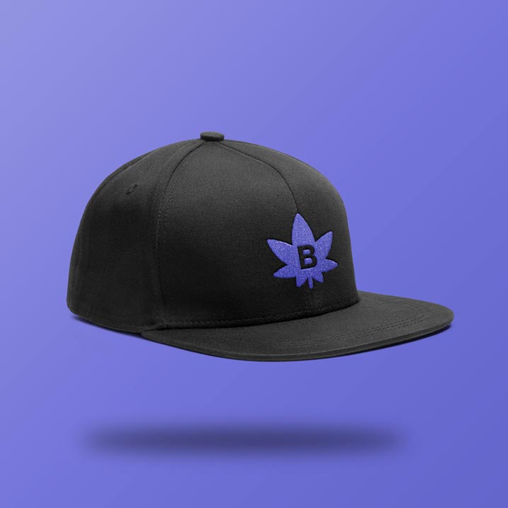 Black baseball cap with embroidered purple Broadleaf Cannabis logo